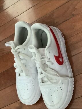 Nike White Kids Sneakers with Red Swoosh